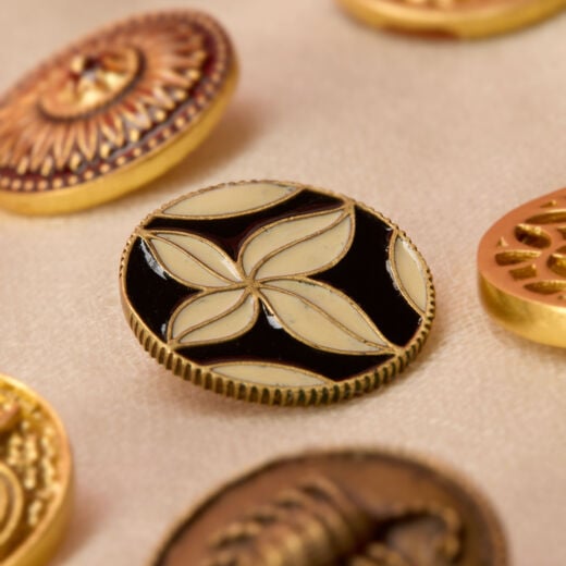 Surreal motifs coat button set